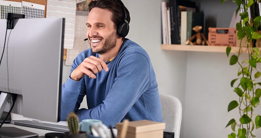 Jabra-Evolve2-65-Flex-Male-Working-Home-Office-Large-scaled